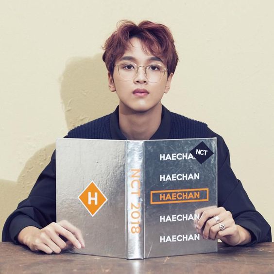 haechan wearing glasses ; a thread