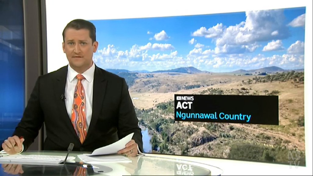I struggled to get a good screenshot of  @Dan_Bourchier tonight. The uniform of black suit/white shirt/Indigenous-themed tie looks good as usual. The overly-styled hair? Not so much.  #GenderBalancingClothingCommentary  #ABCcanberra