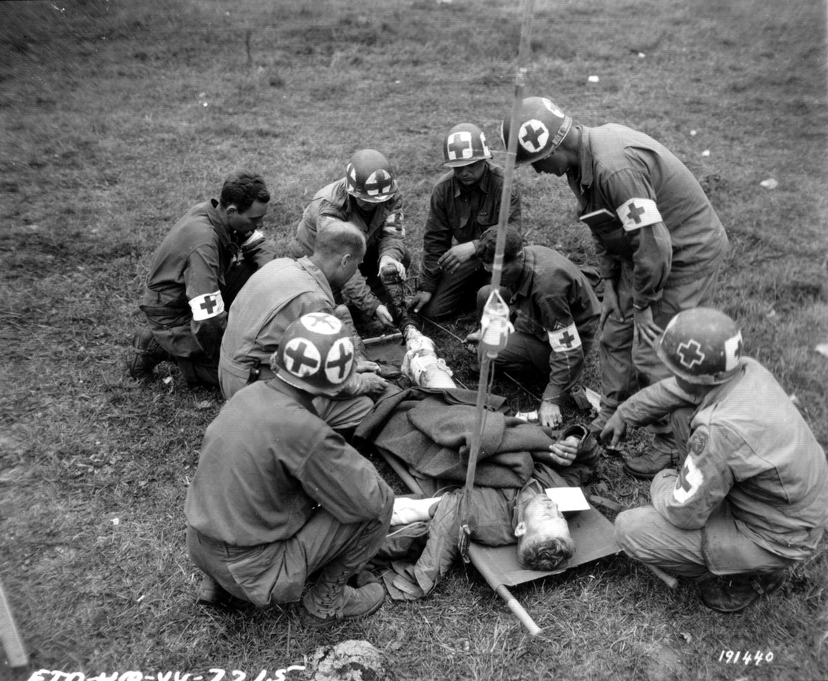 US personnel had similar experiences and their medics learned to apply far more prominent markings to their helmets as time went on.At about 50m an infantryman simply couldn't see the armband.It was often that simple. /18