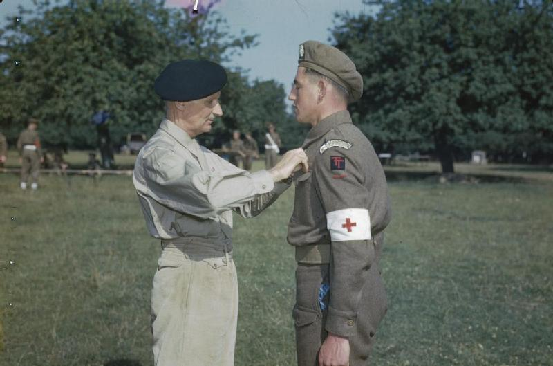 Here L/Cpl G. Baldwin of 7 Green Howards receives an MM from Monty. He's clearly an SB given the armband, but could the enemy notice such things?No.Simple as really.These were too small to be of any use. /16