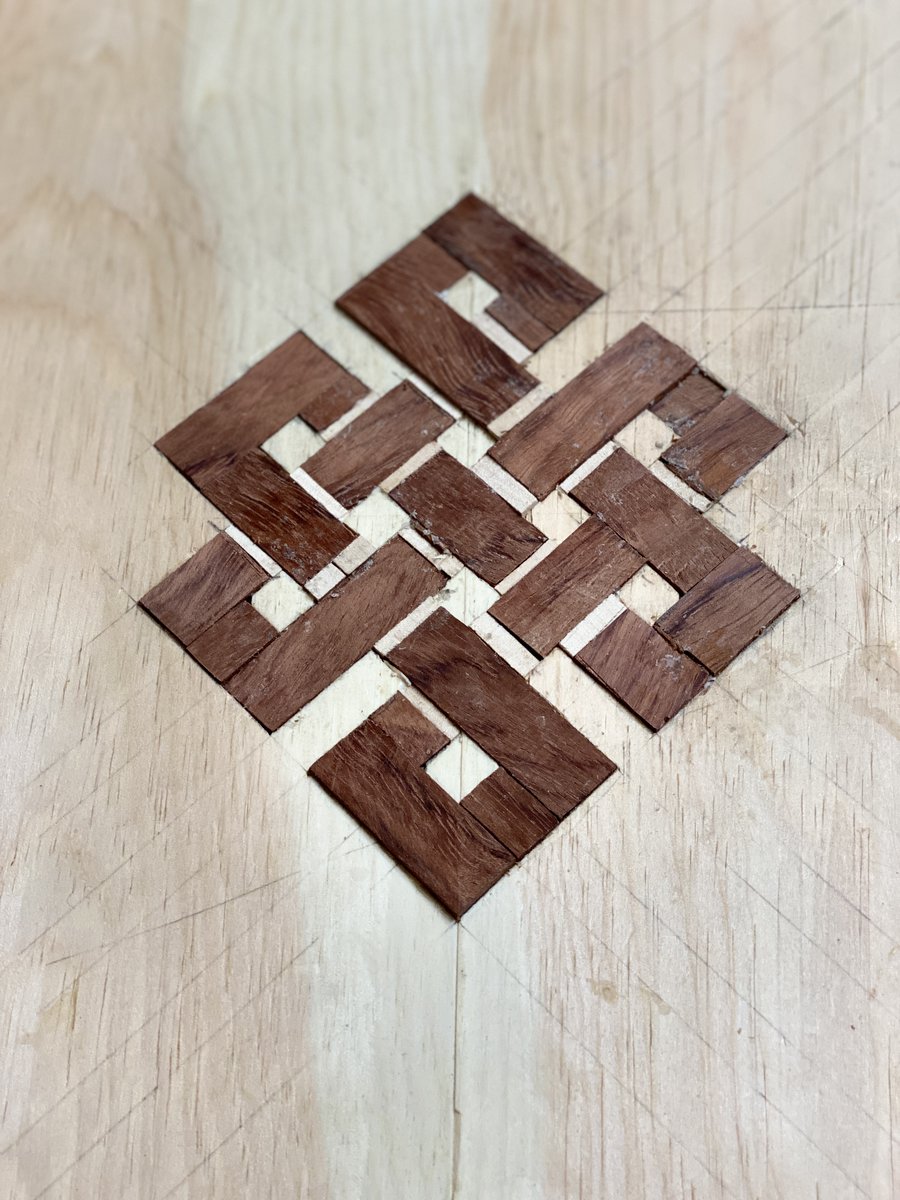 7/ ... South Asian religions - both Samsara and also the interrelationship of the 8 fold path. This was the technically challenging part as I'd never done any inlay work before. Lofted design, chisels used like cutting mortises. The inlay is Bubinga, an African tropical hardwood.