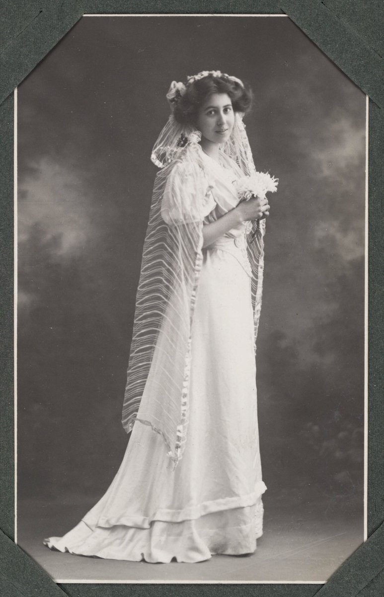 A photographic postcard of a young bride, c.1913