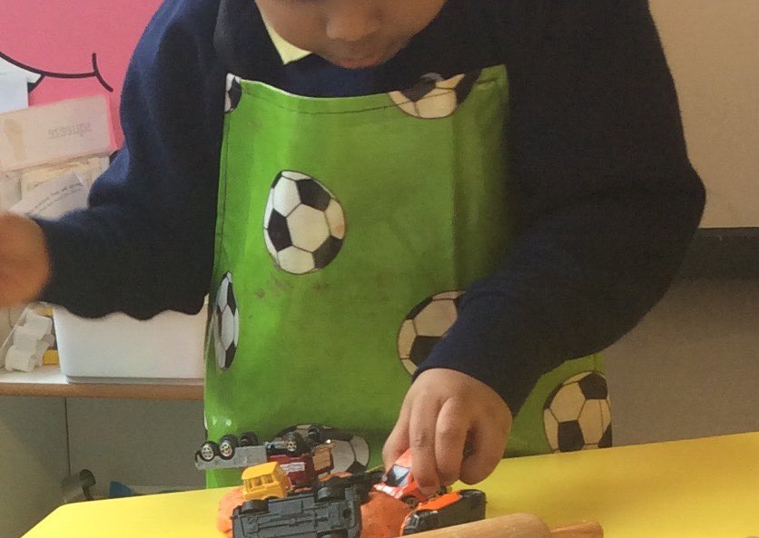 LancotSchool's tweet image. We in Daisy Class make marks anywhere, on paper, paint or chalk the floor. We make and explore marks everywhere! Today the children were fascinated to see the different tyre marks from the toys cars in the playdough. #makingmarks #lancotEYs