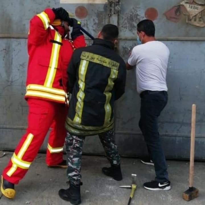 This is Mehdi’s brother Imad, in the white shirt, trying to help put the fire out moments before one of the world’s largest ever non-nuclear explosions.