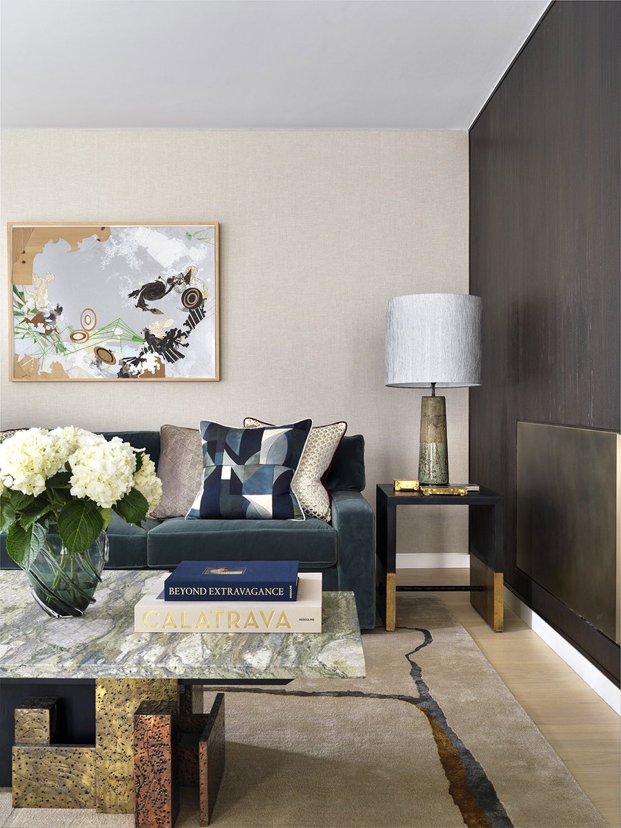 nataliamiyar's tweet photo. I love everything about this shot; the smart velvet sofa upholstered in plush Vienna velvet, the coffee table created from a vintage base and new top. I especially love the art work by Tomas Vu in intricate layers of wood veneer, metal and paper found at @snitzergallery in Miami. https://t.co/d2nw5ZY9yM