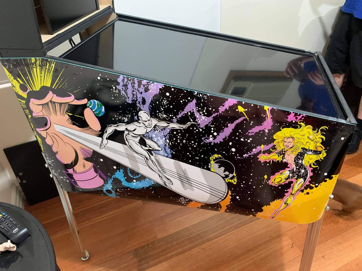 m_halse's tweet image. Pinball machine update. Printed my first mockups of the art for the sides. Really happy with how it turned out! And it's not even the final product (sticky taped the paper to the sides 😅) #virtualpinball #pinballart