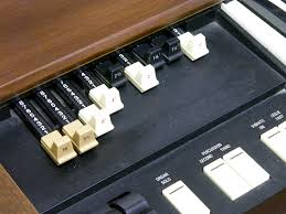 these are called harmonics which *add* to the sound. the hammond organ has a set of controls called "drawbars" which let you mix in different amounts of each harmonic so that you can shape the sound of the organ.