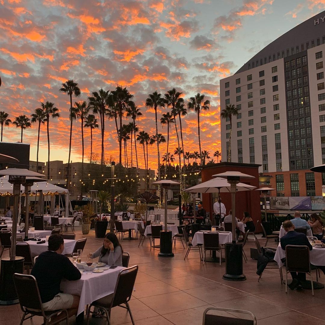 AventineLaJolla's tweet photo. We're so happy to announce that Truluck's La Jolla has reopened! Dine outdoors on their patio while also enjoying the beautiful sunset and nature around you. Reserve a table here: https://t.co/Sj743sfkIh #AventineLaJolla 📸:@shlomila https://t.co/hHhbdKdvXA