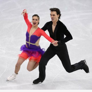2006: ice dancer Tanith Belbin's costume leads to the isu declaring that 40% of a skater's body most be covered in an extension of the katarina rule, which mandated skirts for female skaters in 1988. belbin's iconic silhouette has inspired many dancers' costumes to this day