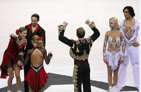 2006: completion of the first olympic quad in 2000s is complete, and the current fs costume trends reflect the eclectic, bright, and textured style of this y2k era. this is the peak of the elaborate costumes in skating, fabric volume will decrease but the bright colors remain