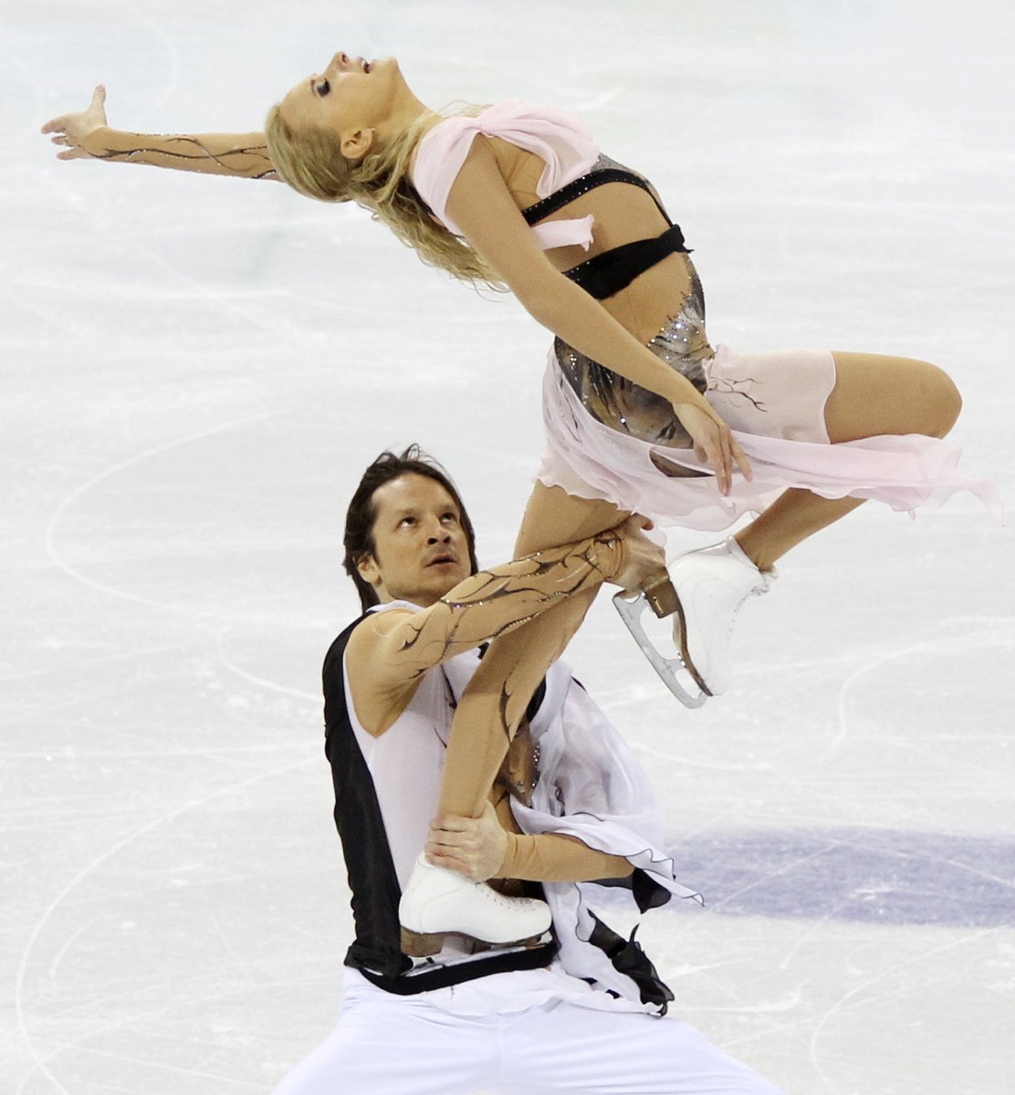 2012: ice dance costumes have fully moved away from the shredded, voluminous style which was maintained until 2010 by ice dancers Domnina/Shabalin. however, as a retro style it's recently made a comeback in 2019 with singles skater Alexandra Trusova.