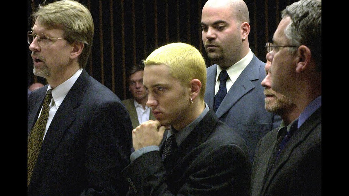 The Kiss skit is an audio reenactment of what happened when Eminem saw his ex, Kim, kissing another man. He runs up to him and punches him, though the man refuted and said it was a pistol whip, which Eminem said was nonsense on the later track, Sing For the Moment.