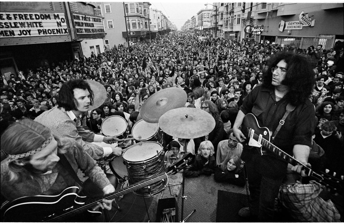 The Grateful Dead performing on Haight Street March 3, 1968. Left to right: Phil Lesh, Bill Kreutzmann and Jerry Garcia. Photo by Jim Marshall Photography LLC
