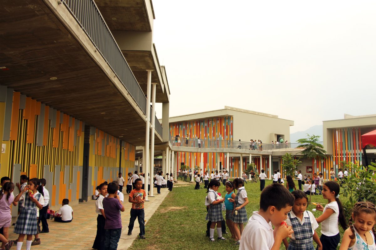 includesign_au's tweet photo. Dynamic integration of indoor and outdoor environments is vital for learning spaces. This school offers a variety of outdoor spaces integrated with dynamic volumes, shape, patterns and colours. 
#schooldesign #courtyards #colombia #includesign #architecturelovers https://t.co/S9GM0aDzSk