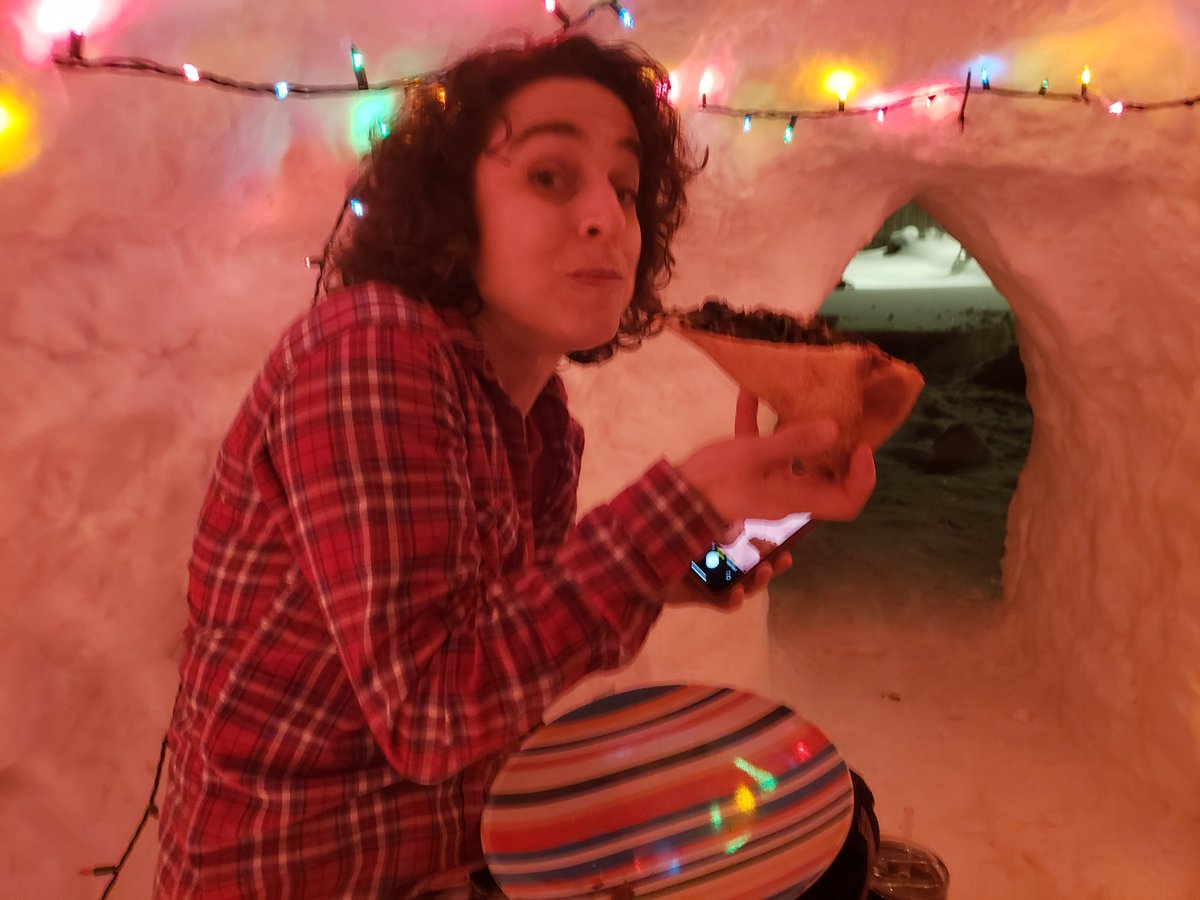 Pizza & beer in the Igloo.31° outside.60° in the igloo.