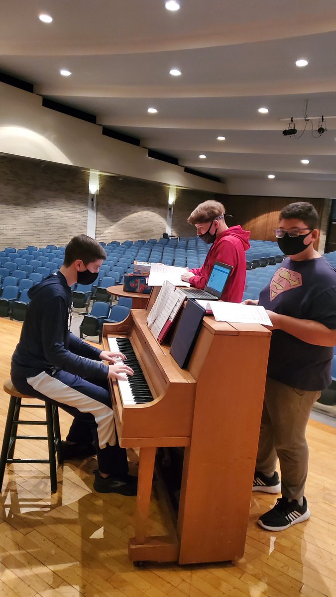 NMS_Choirs_MCS's tweet photo. Busy day today for the Titan Choirs! We had a great Q&amp;A and performance for @MbadeBade class at West View (over zoom). Our unplanned outfits for the Q&amp;A made us look like a cover band album. We also had our first sectionals of the school year!
#MCSmusic #mcsinnovation https://t.co/gA1Kko11P6