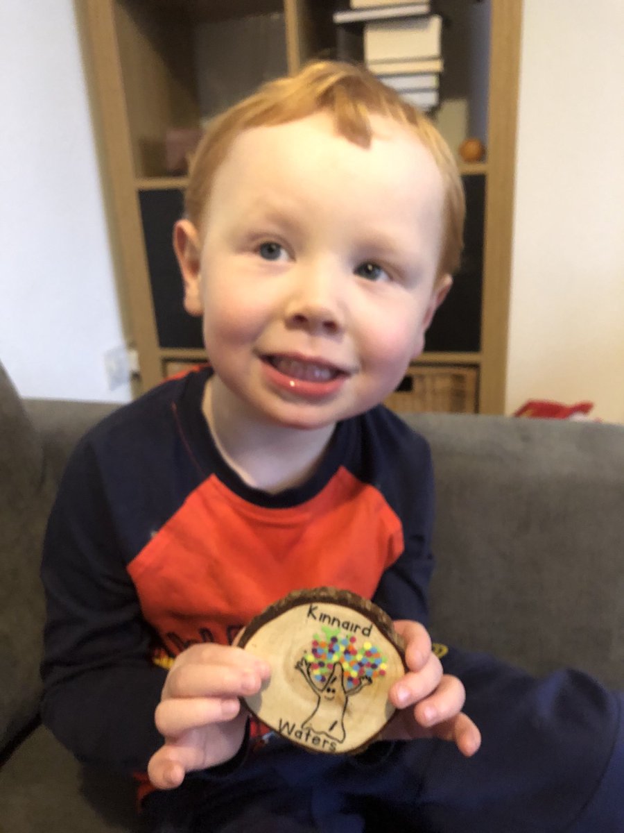 TraceyBrockie's tweet photo. One happy boy! Christopher was so excited when Ashley came to see him and drop off the home pack. He’ll be buzzing for the rest of the day! Thanks Ashley ⁦@KinnairdWaters⁩  and thanks Joanna for making the beautiful wooden signs - they are stunning! https://t.co/i36WnYiiQi