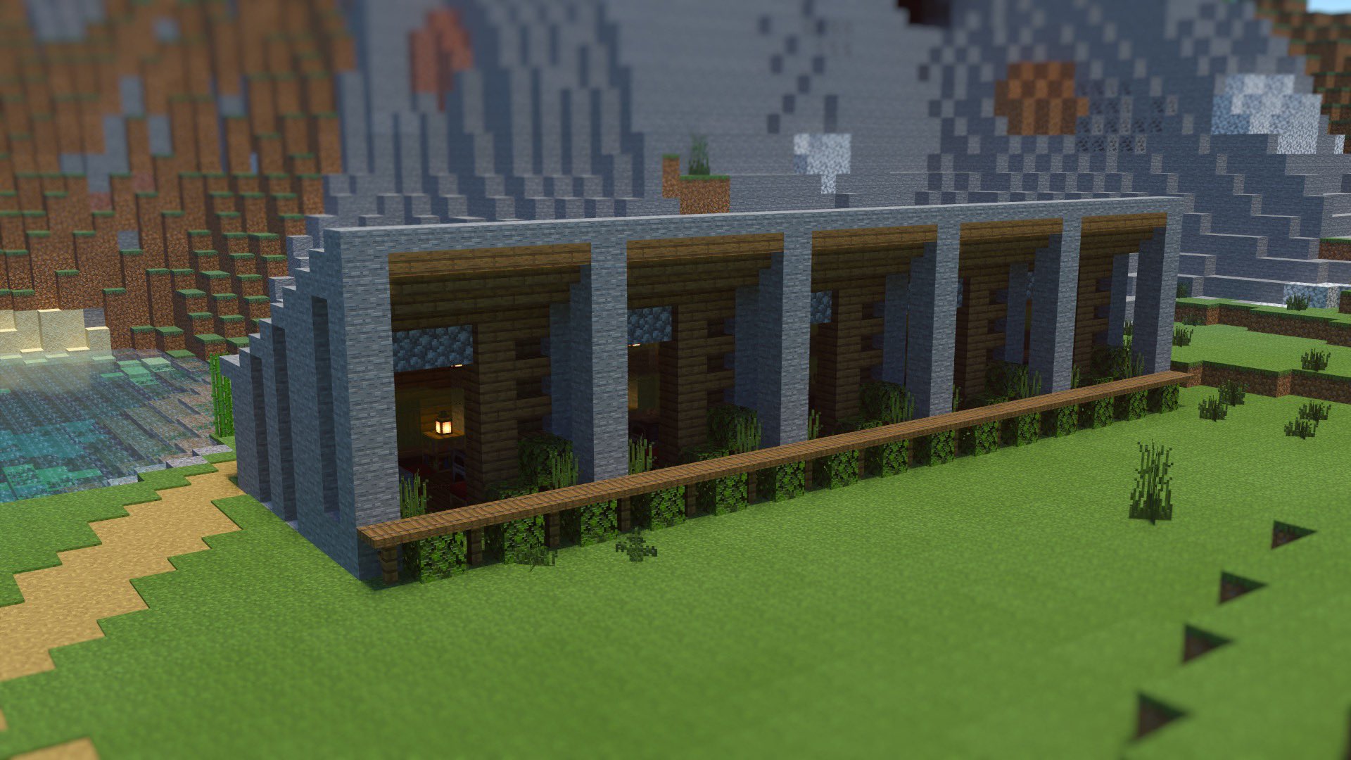 こぐまぷろ Kogumapro 石で集合住宅作ってみました ひとつの建築を並べて作ってます 同じ形が連続しているのも面白いですね 取引用の村人の住処にもしたいなぁ マイクラ Minecraft建築コミュ マインクラフト Minecraft バニラ建築学部