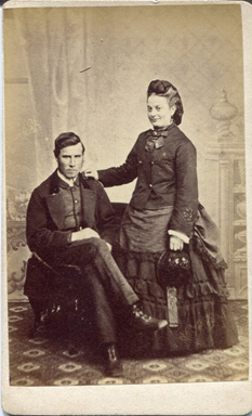 In the early 1870s the bustle style had become popular, which involved fabric draped over half-hoops at the back of the dress. [KLNTY2020.146 & KLNTY2020.156] [6/20]