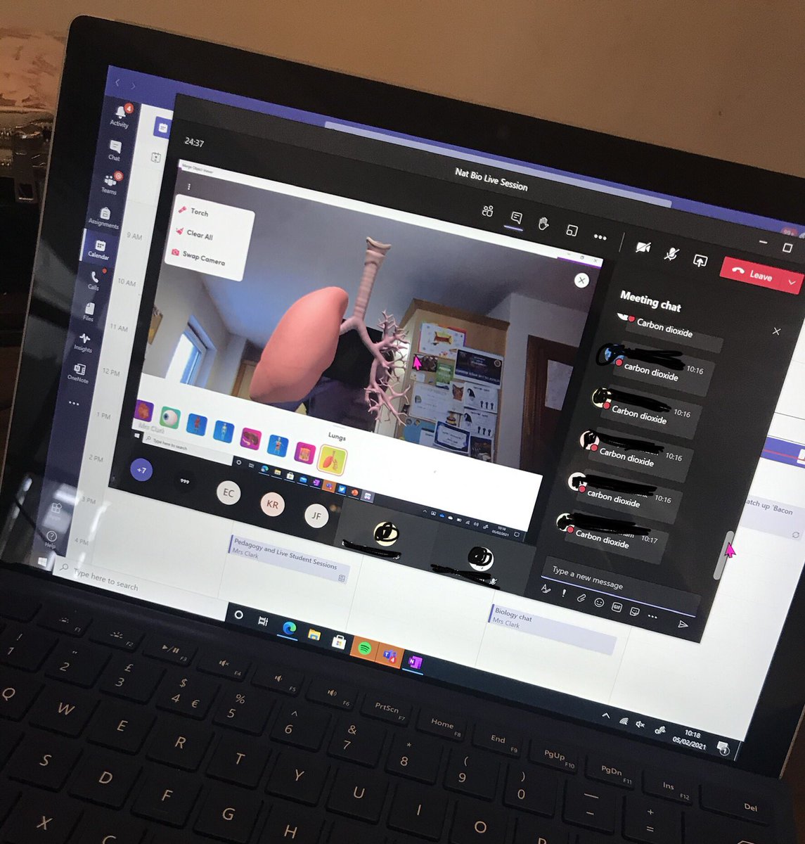 Sfm36's tweet photo. Fab session with the National class today. Mainly in the chat panel but managed to get some 3D models on the go with @MergeVR @Lifeliqe Eye spy game (bonus if you know the shape) and I used my classroom image background to make them feel ‘at home’ in school. #TeamMIEEScotland https://t.co/uXzXV3rCKx