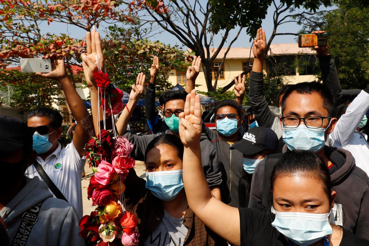 Hundreds of students and teachers took to the streets of Myanmar today to demand the military give power back to elected officials.

Pro-democracy protestors offered roses to police and flashed a three-fingered salute, a sign of resistance borrowed from "The Hunger Games."