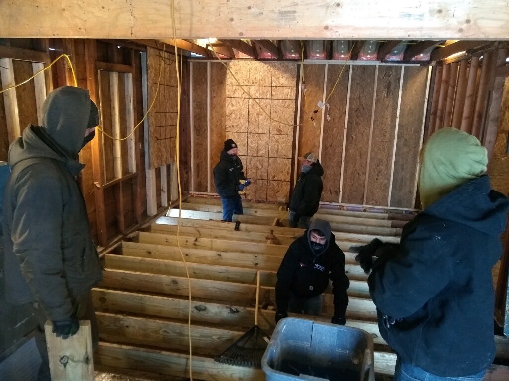 WISDDirCTE's tweet photo. SWWC Building Trades students from @DexterSchools and @masbigreds making progress at the @H4HHuronValley home this morning #ColdWeatherCrew #Skilled2Serve https://t.co/B9PGiEloUx