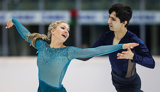 2018: Canadian designer Mathieu Caron's iconic 2018 Moulin Rouge costumes for Virtue/Moir make a mictrotrend in high-collars and the “Tessa Virtue” silhouette for girls’ costumes, and mesh in mens’ costumes, seen in Carriera Pomereko(2019), Lajoie/Lagha (2019) & Eunsoo Lim(2020)