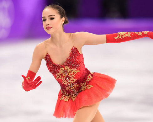 2018: Olga Ryabenko, costume designer for all of Eteri Tutberidze’s students, evolved her own style this year into one with intricate appliqués, sequins, and crystals upon layers of fabric, seen in Evgenia Medeveda, Alexandra Trusova, Aliona Kostronaia, and Alina Zagitova