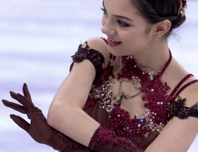 2018: Olga Ryabenko, costume designer for all of Eteri Tutberidze’s students, evolved her own style this year into one with intricate appliqués, sequins, and crystals upon layers of fabric, seen in Evgenia Medeveda, Alexandra Trusova, Aliona Kostronaia, and Alina Zagitova