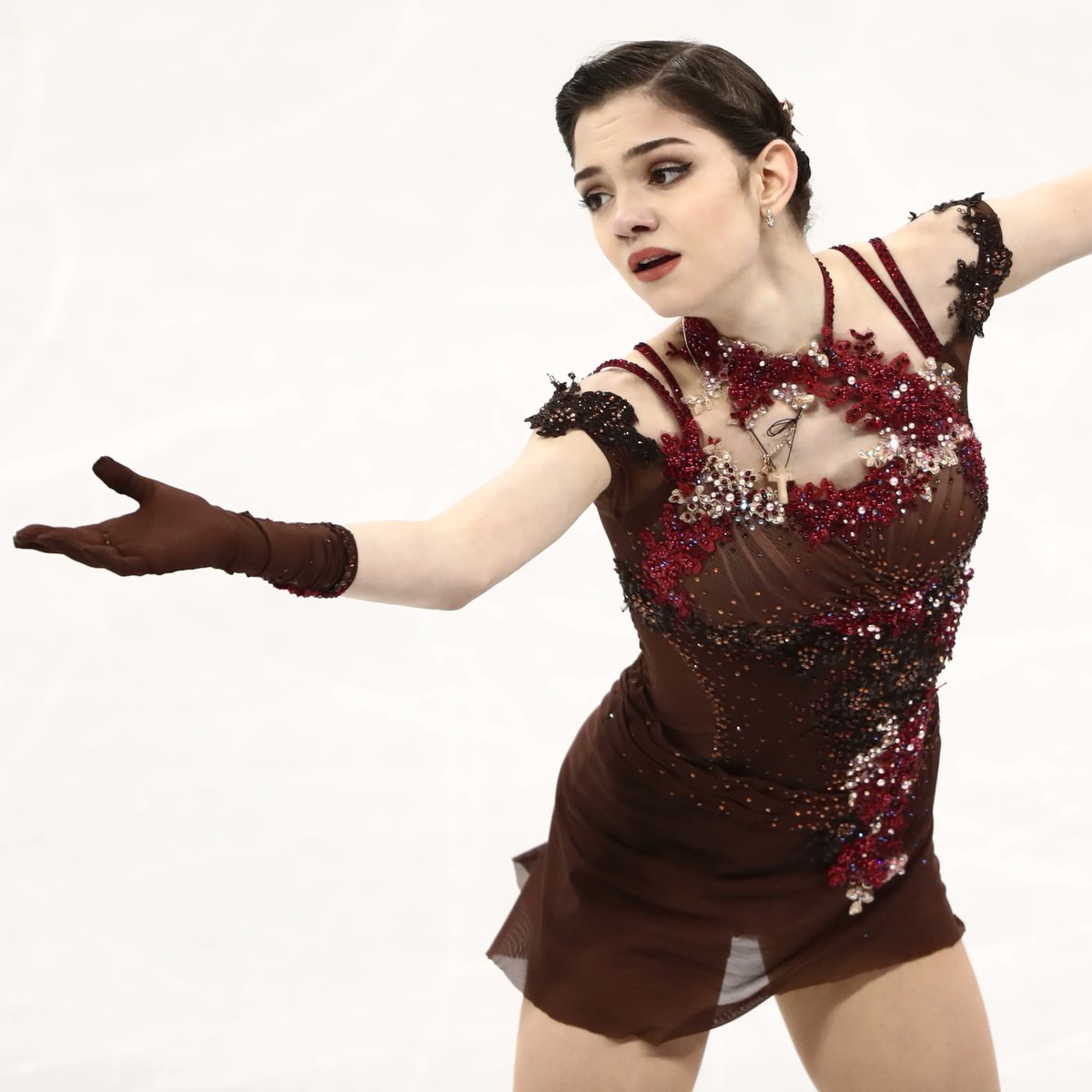 2019: Ryabenko’s current signature style of heavy use of appliqués in her clients extends to other disciplines and countries, seen seen pairs skater Ashley Cain, and singles skaters Kaori Sakaomoto.