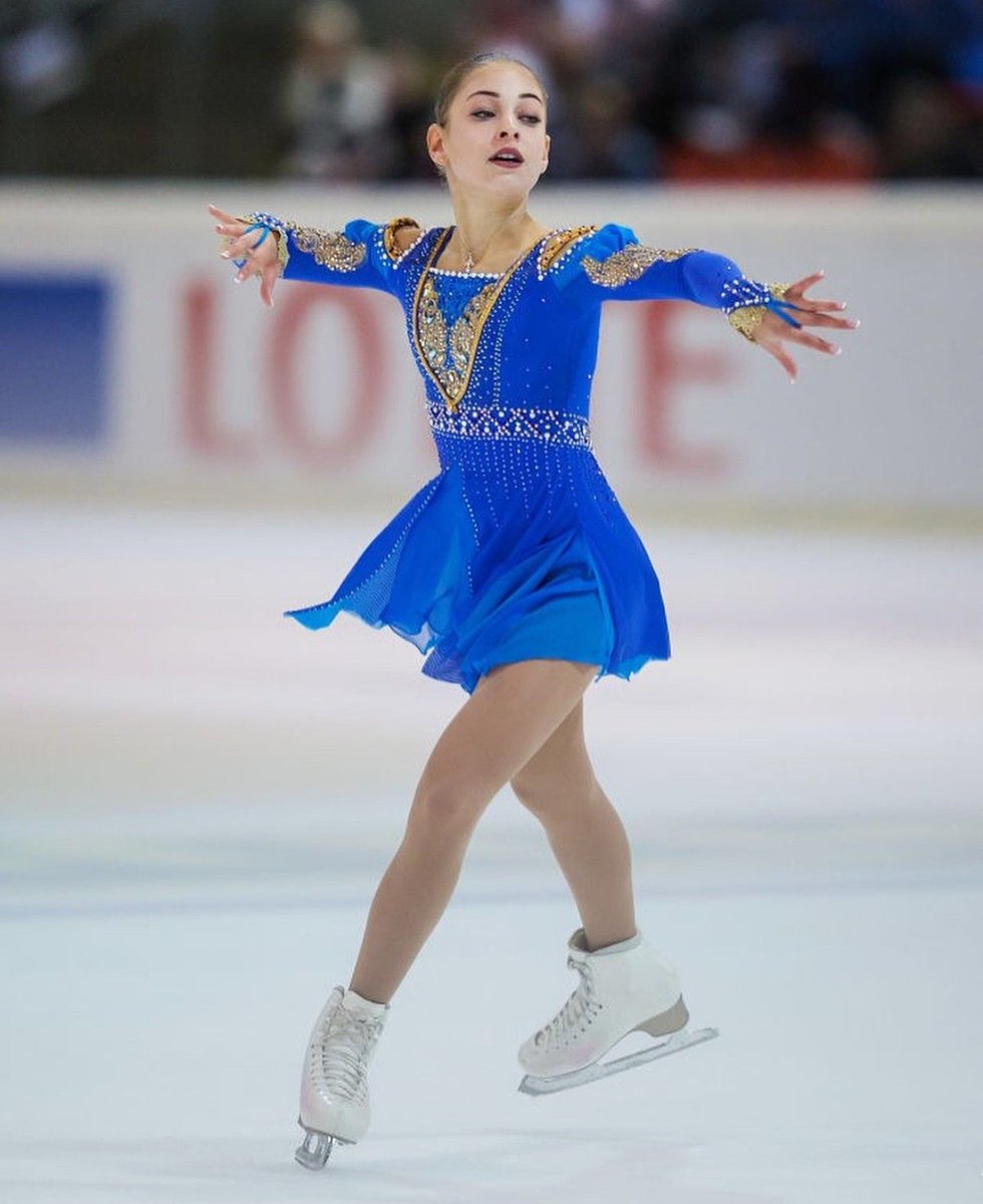 2019: Ryabenko’s current signature style of heavy use of appliqués in her clients extends to other disciplines and countries, seen seen pairs skater Ashley Cain, and singles skaters Kaori Sakaomoto.
