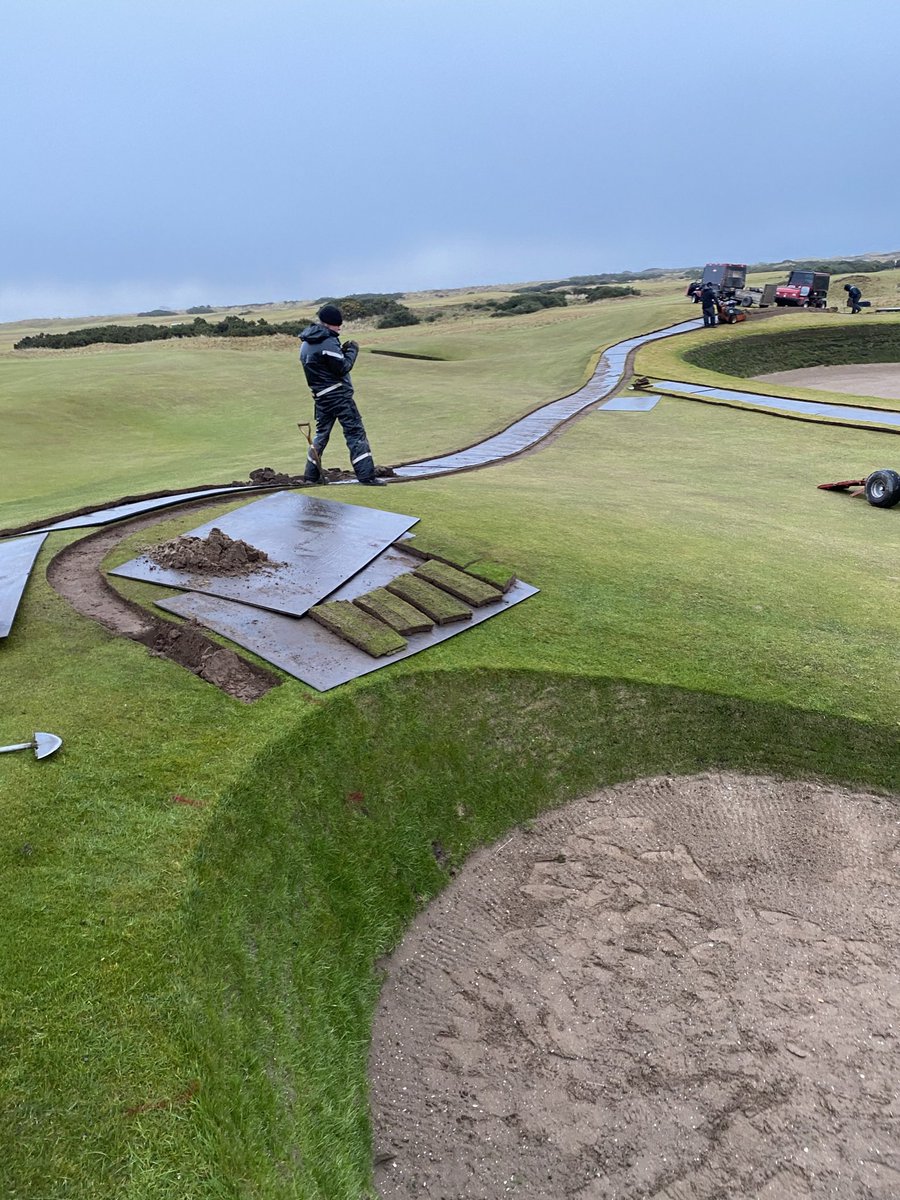 Berry97's tweet photo. Busy week @TheHomeofGolf. The squad have been hard at it considering the brutal conditions. Whilst installing Tv Camera Ducting into #StrathBunker, we took the opportunity to install some irrigation around #ShellBunker. Hopefully better weather is on the cards soon. #Open22Prep https://t.co/zmucsHWfVA