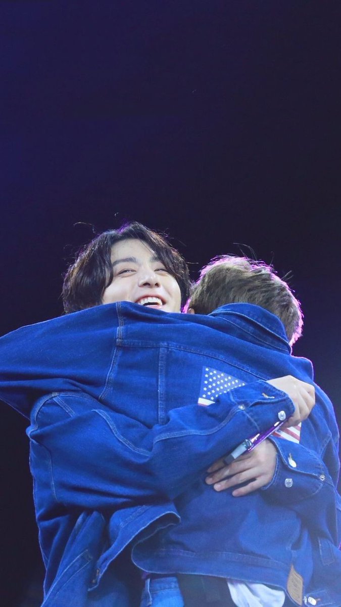 Jungkook's smile when Joon hugs him