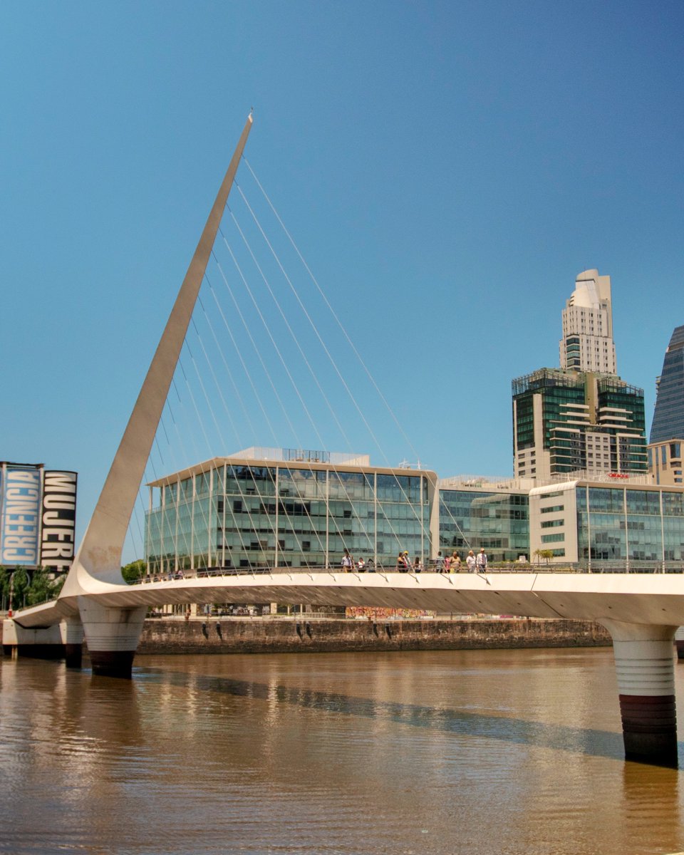 🖼😍 One of the most famous postcards of the City of Buenos Aires shows Women's Bridge, in Puerto Madero. Who would you like to cross this bridge with? @travelbaires
