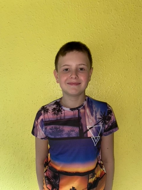 Wow, what lovely work by Cameron! We just love your pirate ship and your fantastic persuasive writing. It is lovely to see Cameron celebrating Children's Mental Health Week too by wearing brightly-coloured clothes!