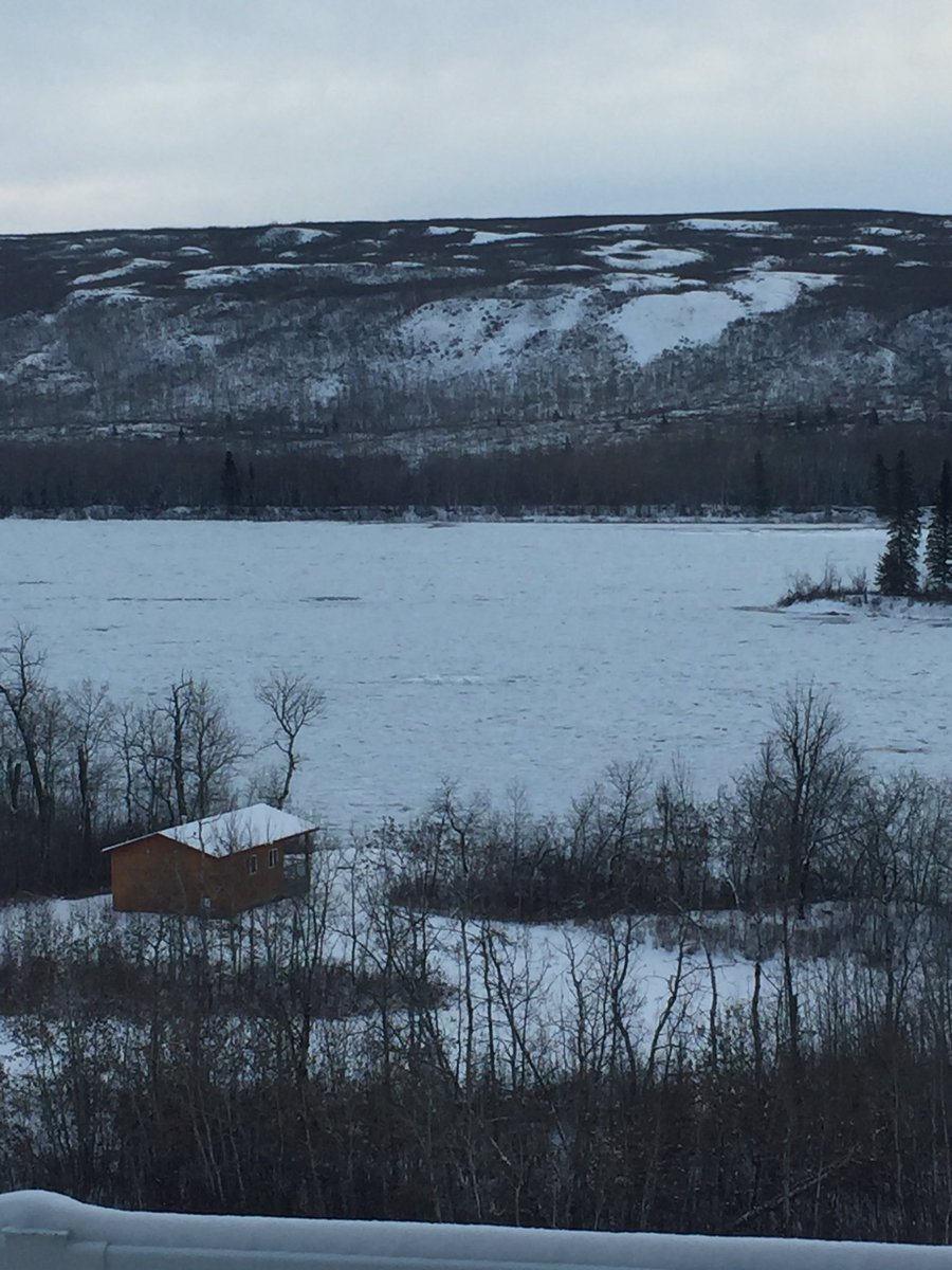 Well the river stopped moving, well the ice stopped! The Peace River is officially froze over this morning at our house.