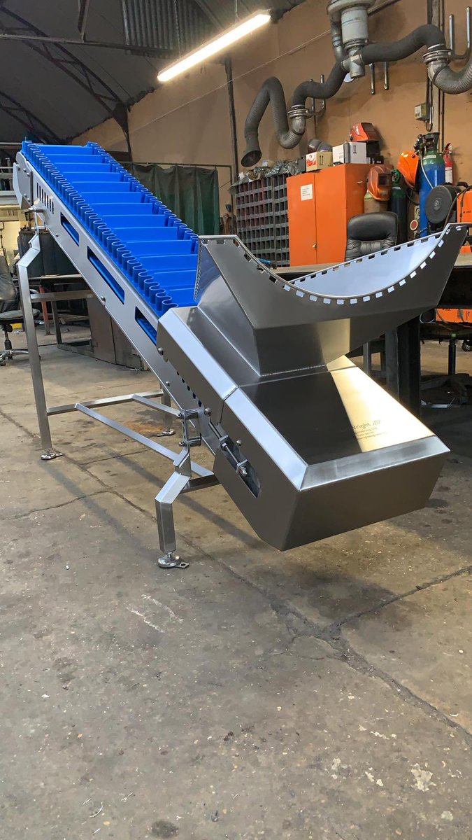 NickTreacher's tweet photo. After our design team worked their magic our Stainless steel division here at JWE have been busy this week fabricating this Elevator with a side wall flex belt for a crisp factory. All cleaned up ready to be wrapped and delivered to our customer. https://t.co/3KkdVzz2nO