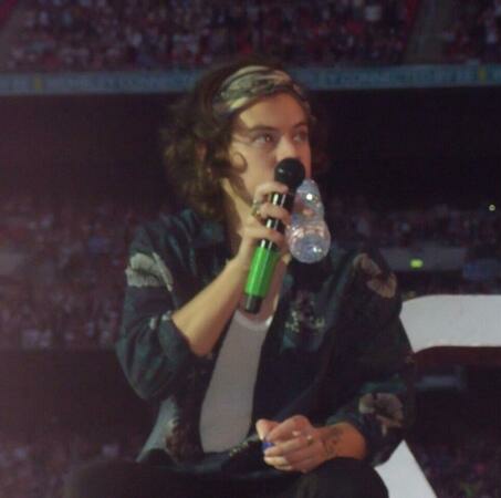 11. Harry watching louis on the night screen while louis is watching Harry