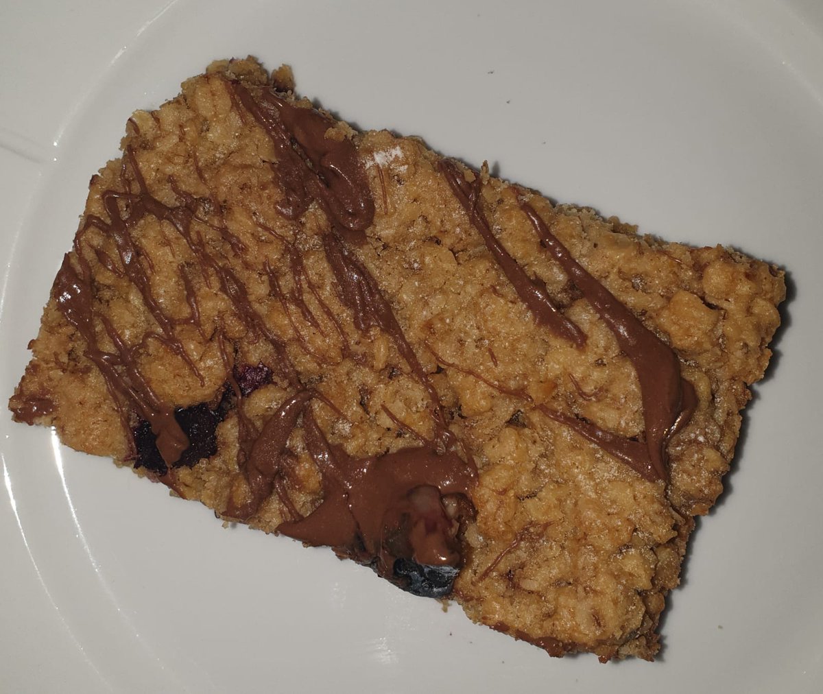 BlakestownS's tweet photo. Ms Quinn has sent in her baking challenge entry for the #GAASolo challenge. Blueberry flapjacks are always a tasty snack. @BlakestownCS @gaafutureleader Well done. https://t.co/NBlzVUruI3