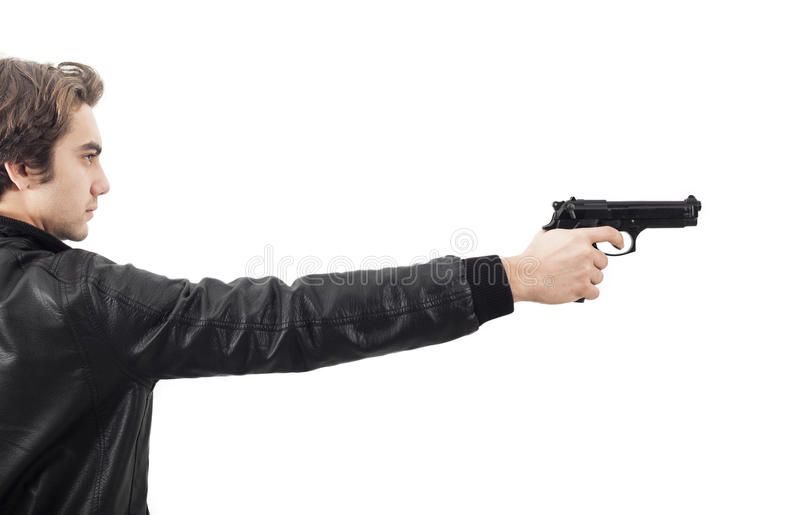 Наган в руке. Вытянутая рука с пистолетом. Парень с автоматом. Дуло пистолета. Стволы вверх.