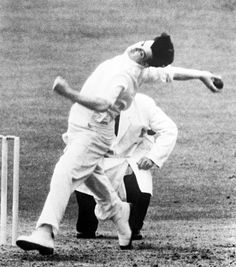 His body swung round so completely the batsman saw his left shoulder-blade, for a short while the left foot – large as a policeman’s according to rustic analogy – hovered in the air before thudding on the ground with violence. The left arm pointed high, head steady, eyes glaring.