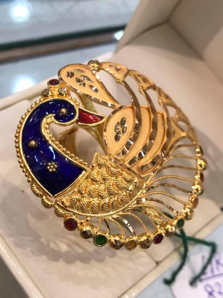 JD Jewellers - Peacock Ring in Gold with Swarovski Diamonds #peacock #ring  #swarovski #meenakari #goldprice #diamond #yellowgold #designer #beautiful  #picture #buy | Facebook