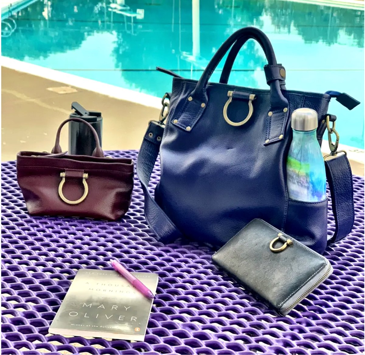 It's never too early to start dreaming of warmer days... ☀️

"Chole &amp; Roger go to the Pool"
.
"I love the funtionality &amp; idea that these bags can go anywhere- even to work at a pool &amp; look cool!"
.
Review from our lovely customer Nicole B 👜💙
