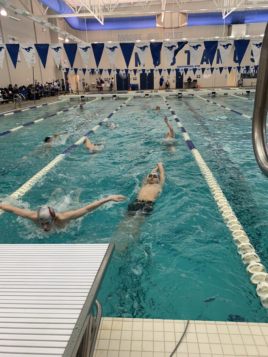 It’s a beautiful day for some fast swimming!! Boys are in the water warming up for prelims.
 
Prelims begin at 10:30 am.
