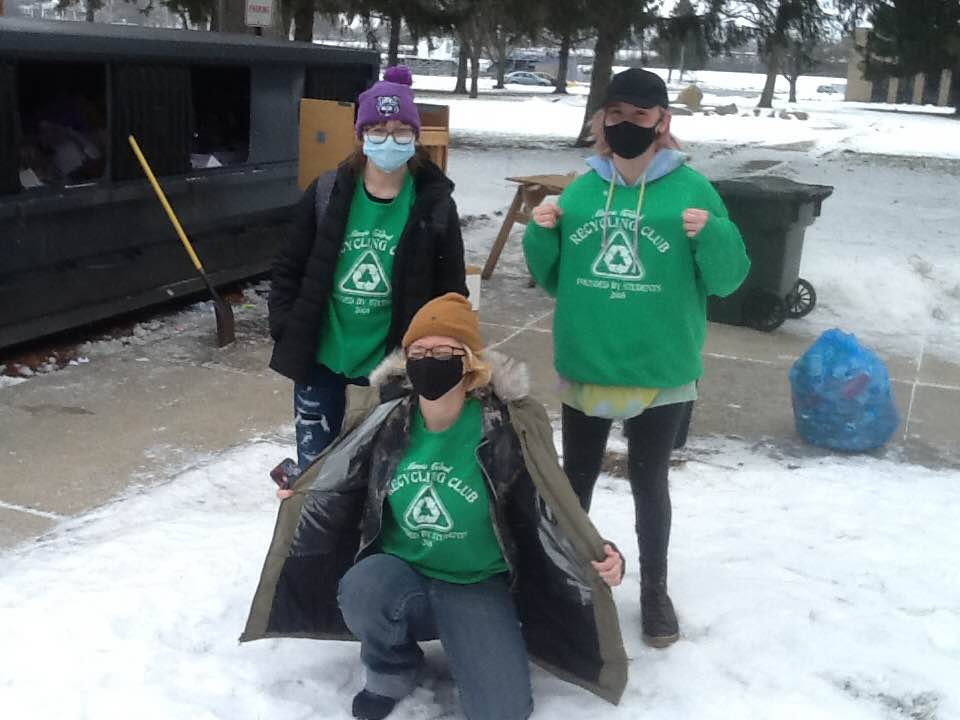 Keeping warm with the new sweatshirts they earned for being dedicated members!