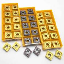 Inserts! At some point, learn how to make your own cutting tools with HSS. Its good practice. But if your lazy like me, Carbide! But two identical looking inserts are not the same! There is a reason one is $0.50 and the other is $35.00! I pay about $5 each.