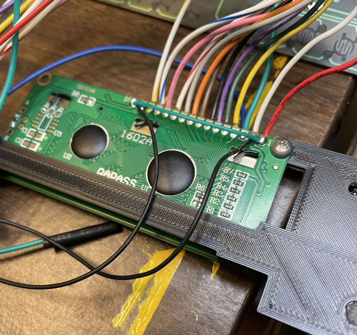 Screen wired up! Easy enough, Pins 1-14 on the new board line up with the 14 wires from the old screen (same order).Pins 15 and 16 are jumpered to pin 2 and pin 1 to provide power and ground connections for the backlight (respectively).