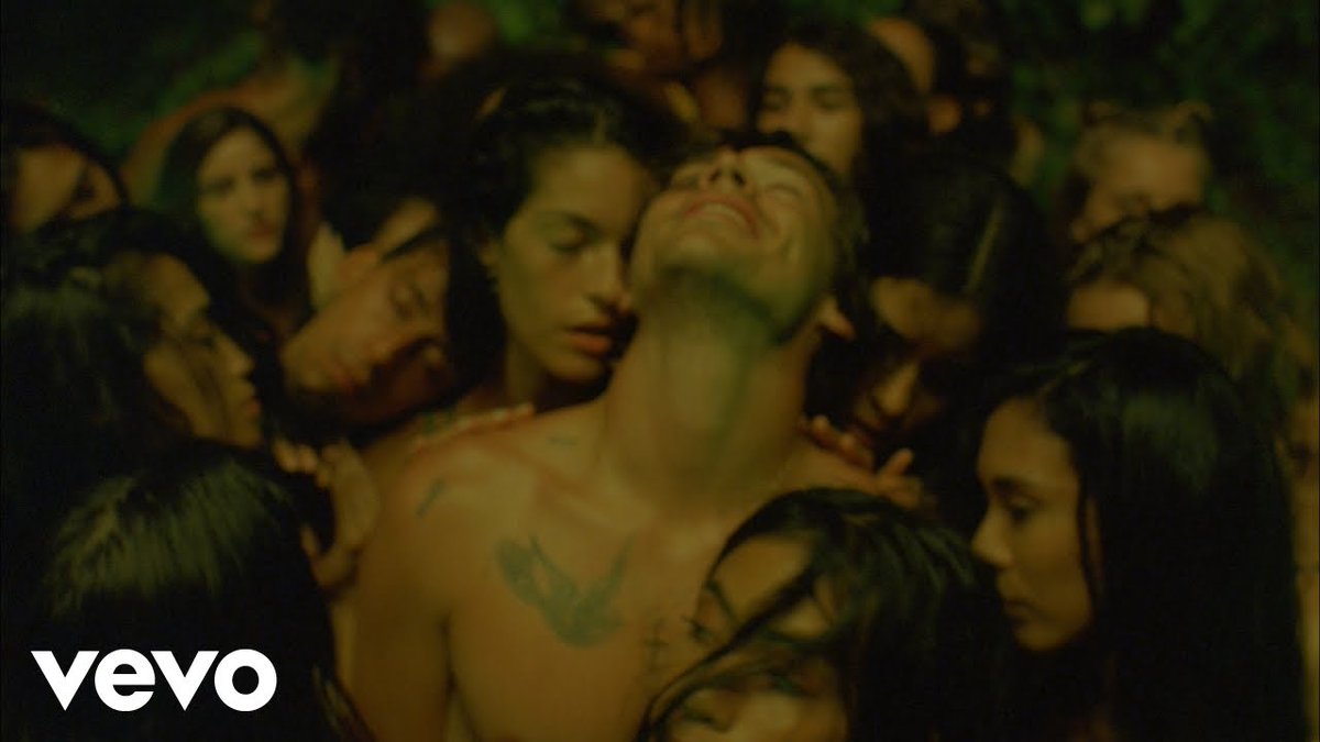 In the music video Harry is surrounded by women AND men touching him.