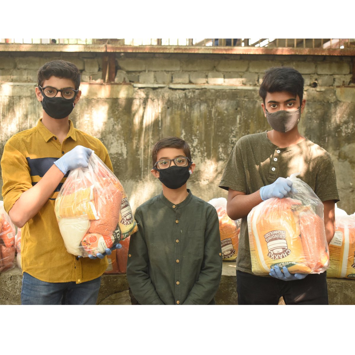 IDF_INDIA's tweet photo. Aditya and Manas from 9th grade are visionaries 
IDF https://t.co/FMKaM8k6Yr Heal - provided dry ration kits to 51 visually challenged families at Tilak Road in Mumbai. These visually challenged persons, who sing in the #Mumbailocal train. https://t.co/77L97LSa9w