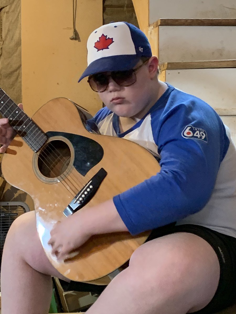 KaraAllen16's tweet photo. Between innings during the Challenger Baseball Winter Jamboree Jude played with his new guitar #BlueJays @JaysCare #TBJWinterFest #bluejayscommunity https://t.co/51dJvA8GbT